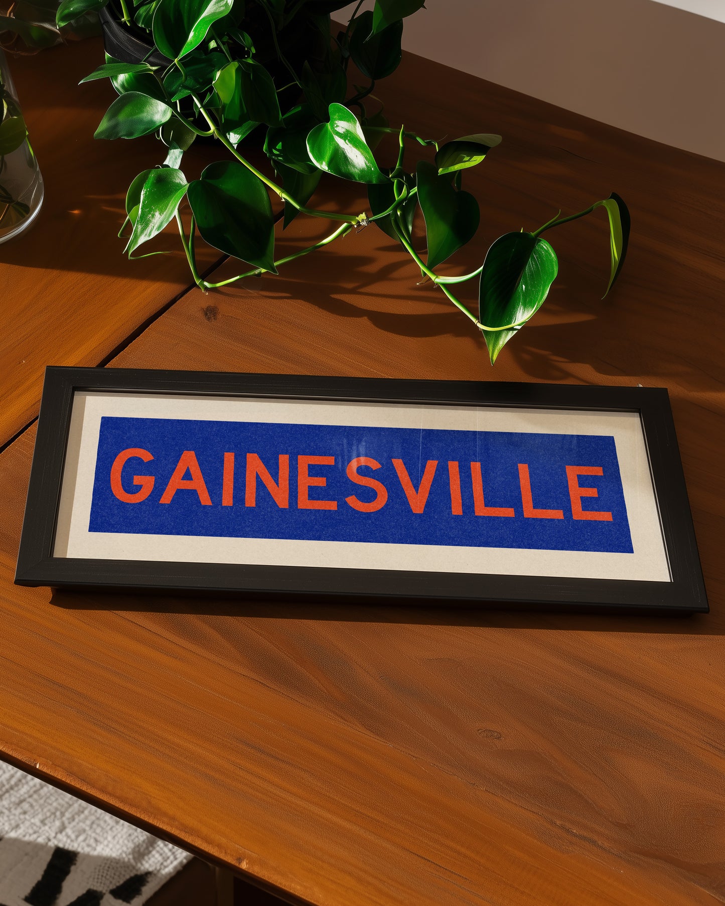 Framed Gainesville Blue Bus Scroll