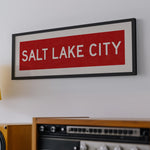 Framed Salt Lake City Red Bus Scroll - Tejas Country Club