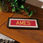 Framed Ames Red and Gold Bus Scroll - Tejas Country Club