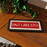 Framed Salt Lake City Red Bus Scroll - Tejas Country Club