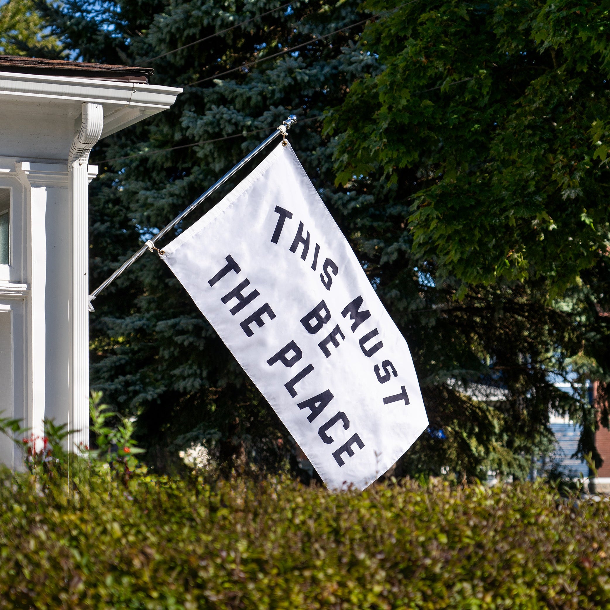 This Must Be The Place Outdoor Flag - Tejas Country Club