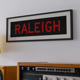 Framed Raleigh Red and Black Bus Scroll - Tejas Country Club