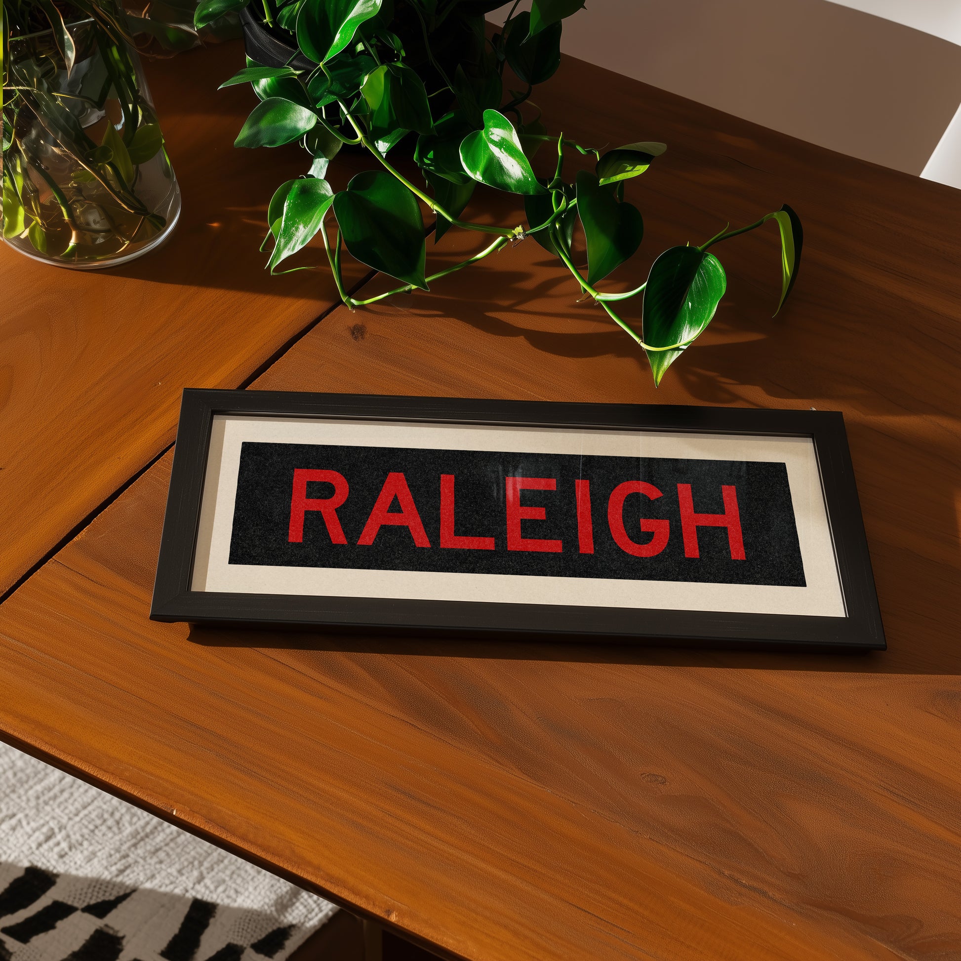 Framed Raleigh Red and Black Bus Scroll - Tejas Country Club