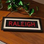 Framed Raleigh Red and Black Bus Scroll - Tejas Country Club