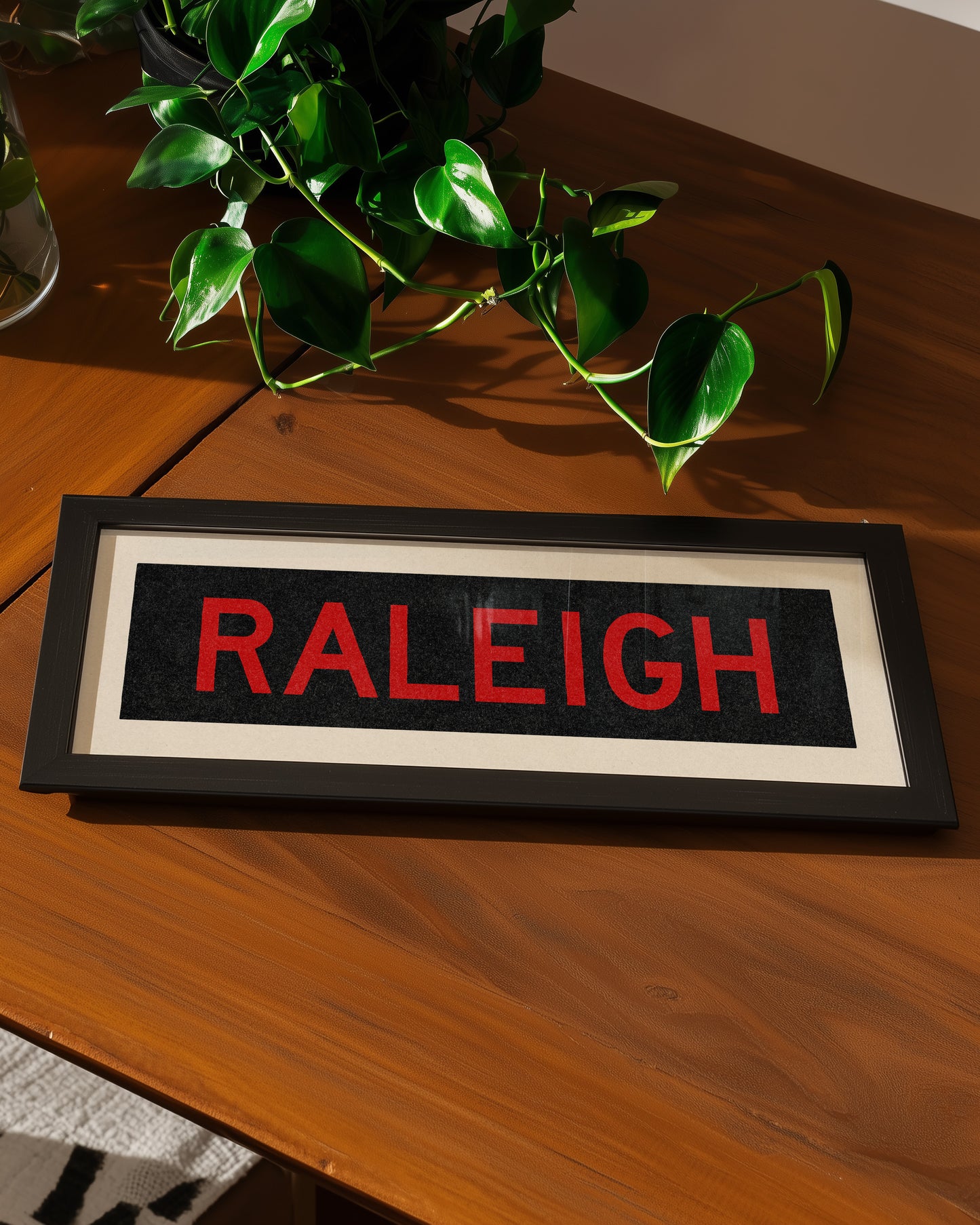 Framed Raleigh Red and Black Bus Scroll - Tejas Country Club