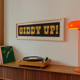 Framed GIDDY UP! Sign Black & Gold Art Print - Tejas Country Club