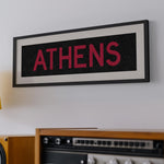 Framed Athens Red and Black Bus Scroll - Tejas Country Club