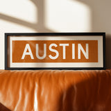 Framed Austin Orange Bus Scroll - Tejas Country Club