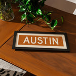 Framed Austin Orange Bus Scroll - Tejas Country Club