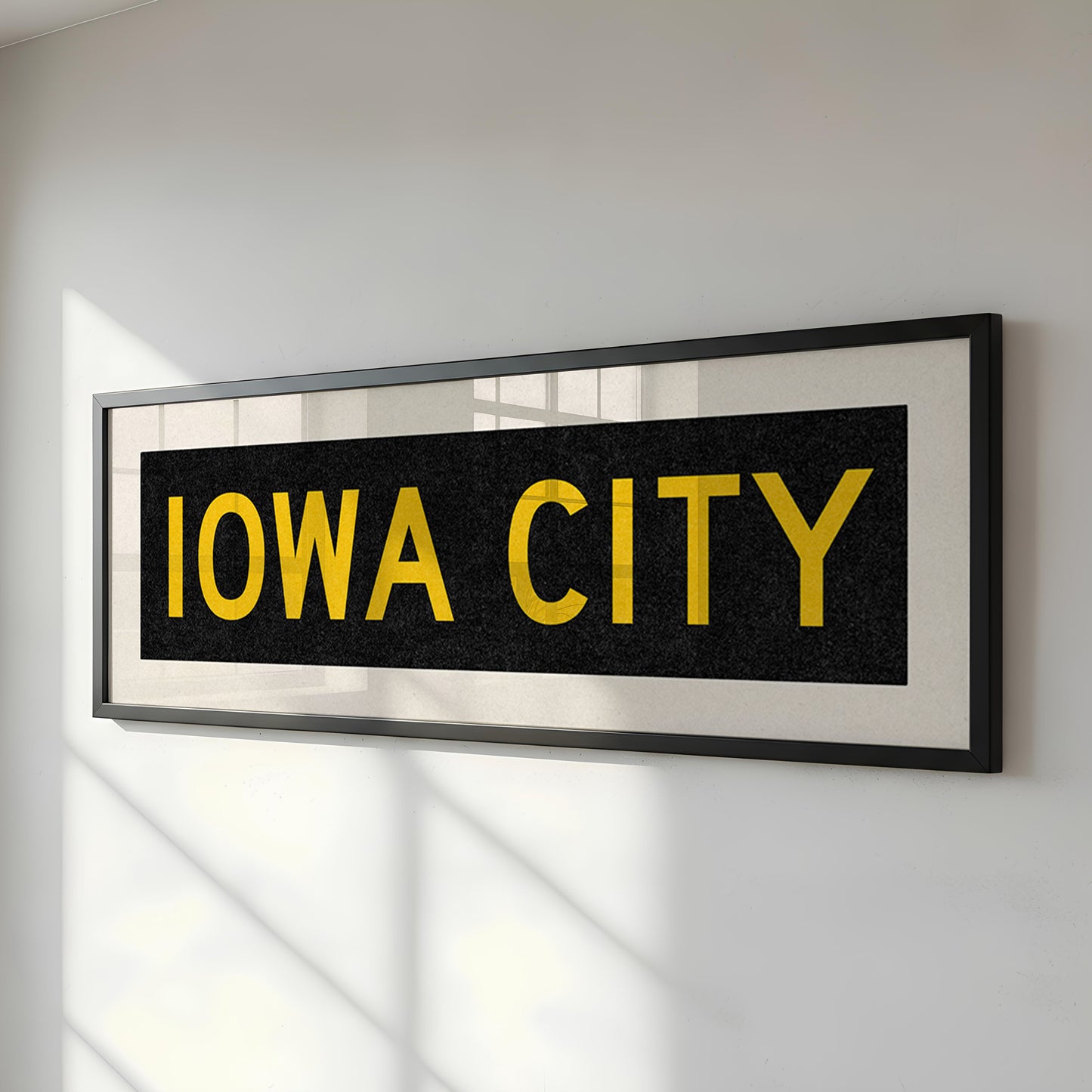 Framed Iowa City Black and Gold Bus Scroll
