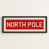Framed North Pole Red Christmas Art Print