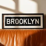 Framed Brooklyn New York Bus Scroll - Tejas Country Club