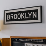 Framed Brooklyn New York Bus Scroll - Tejas Country Club