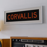 Framed Corvallis Orange and Black Bus Scroll