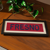 Framed Fresno Red and Blue Bus Scroll - Tejas Country Club