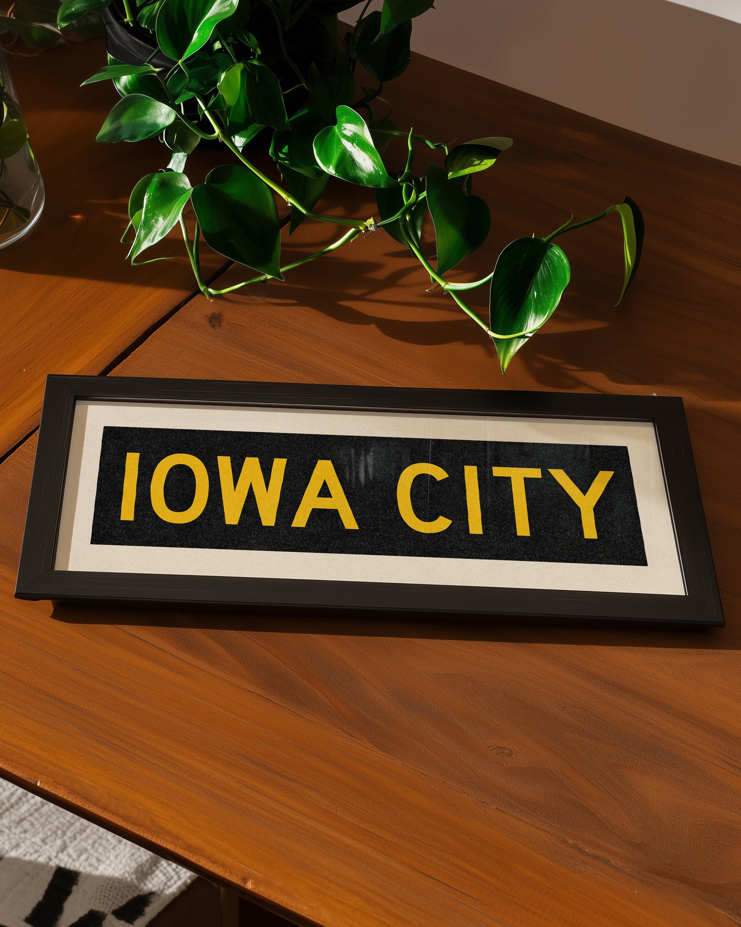 Framed Iowa City Black and Gold Bus Scroll