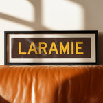 Framed Laramie Brown and Gold Bus Scroll - Tejas Country Club