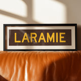 Framed Laramie Brown and Gold Bus Scroll - Tejas Country Club