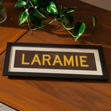 Framed Laramie Brown and Gold Bus Scroll - Tejas Country Club