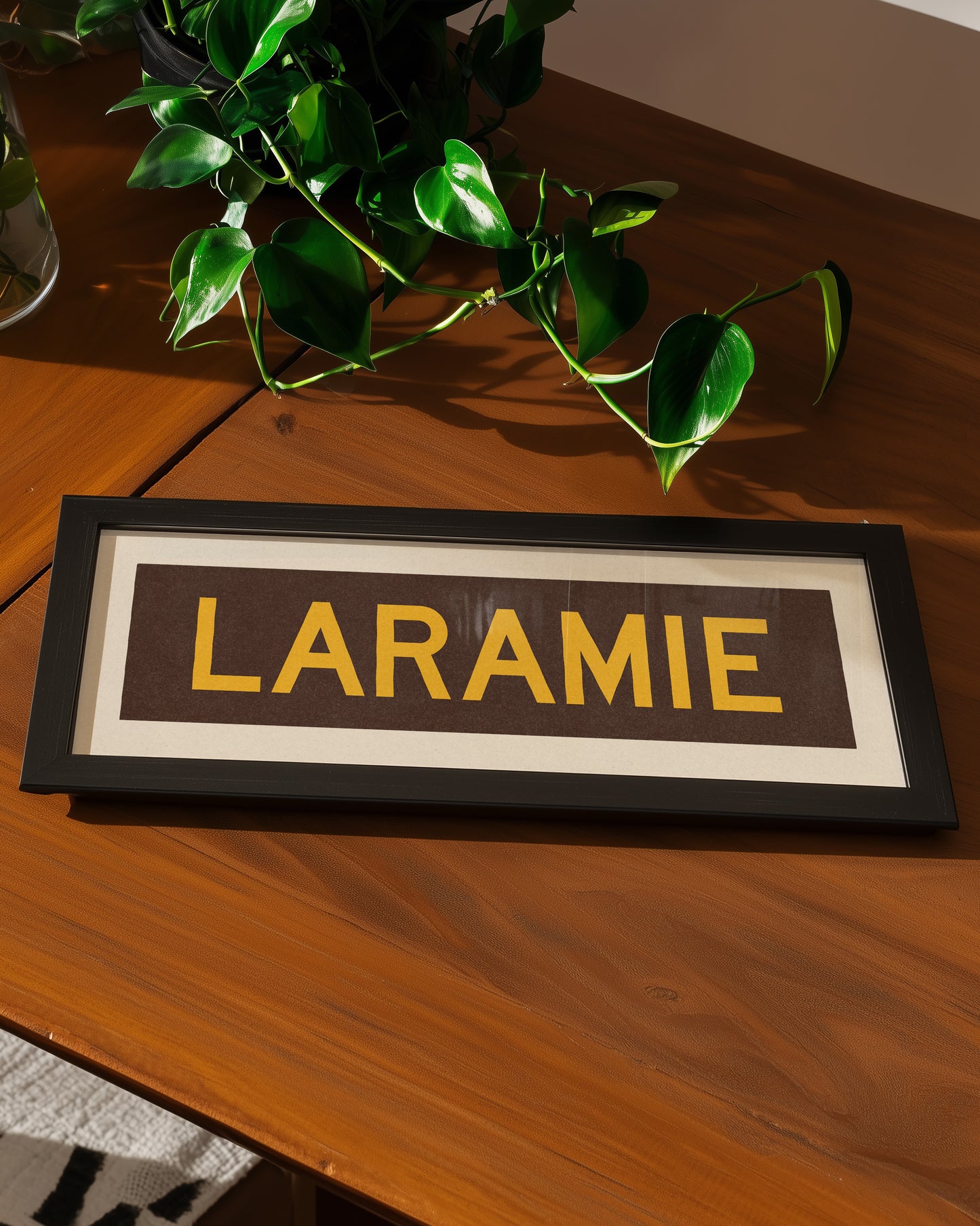 Framed Laramie Brown and Gold Bus Scroll - Tejas Country Club