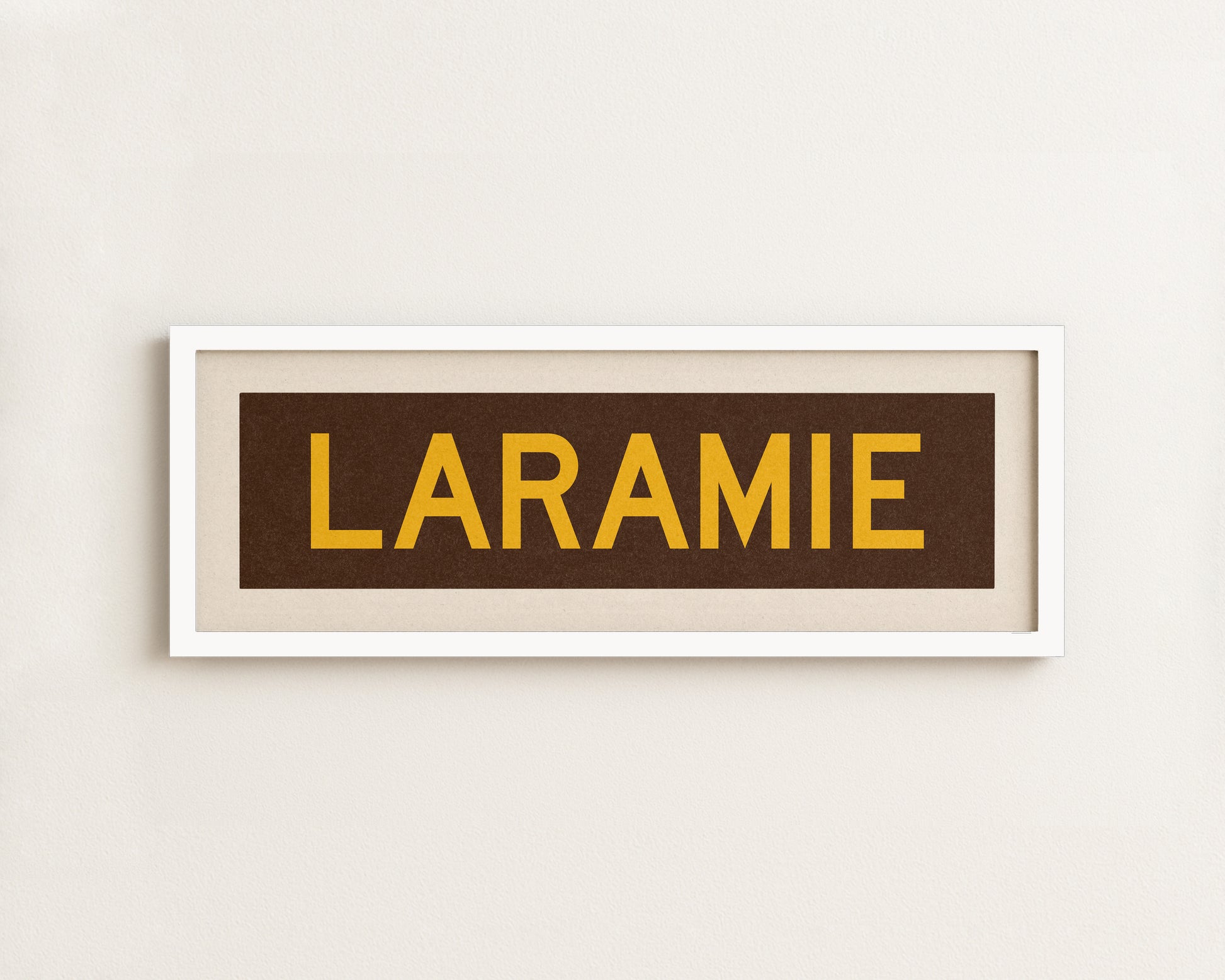 Framed Laramie Brown and Gold Bus Scroll - Tejas Country Club