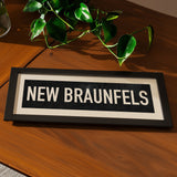 Framed New Braunfels Bus Scroll Sign - Tejas Country Club