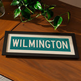 Framed Wilmington Teal and White Bus Scroll - Tejas Country Club